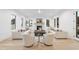 Cozy living room with fireplace, large windows, and comfortable seating at 3401 Makers Cir, Raleigh, NC 27612