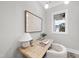 Home office or study with natural light and a simple desk setup at 3401 Makers Cir, Raleigh, NC 27612
