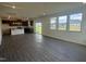 Spacious living room with hardwood floors and sliding glass doors at 323 Chestnut Oak Ln, Lillington, NC 27546