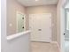 Upstairs hallway with double doors to a storage area at 204 Cardinal Ct, Oxford, NC 27565