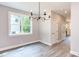 Bright dining room with chandelier and hardwood floors at 204 Cardinal Ct, Oxford, NC 27565