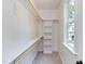 Large walk-in closet with shelving and hanging rods at 204 Cardinal Ct, Oxford, NC 27565