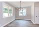 Bright dining room with chandelier and hardwood floors at 204 Cardinal Ct, Oxford, NC 27565