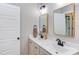 Modern bathroom with double vanity, updated fixtures and large mirrors at 204 Cardinal Ct, Oxford, NC 27565