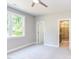 Spacious bedroom with ensuite bathroom access and large window at 206 Cardinal Ct, Oxford, NC 27565