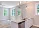 Modern kitchen island with granite countertop and stainless steel dishwasher at 206 Cardinal Ct, Oxford, NC 27565