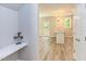 Open concept kitchen with island and white cabinets at 206 Cardinal Ct, Oxford, NC 27565