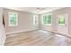 Spacious living room with hardwood floors, neutral walls, and ceiling fan at 206 Cardinal Ct, Oxford, NC 27565