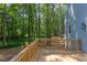 Wooden deck overlooking wooded backyard at 206 Cardinal Ct, Oxford, NC 27565