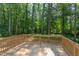 Wooden deck overlooking wooded backyard at 206 Cardinal Ct, Oxford, NC 27565