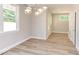 Modern dining room with hardwood floors and stylish light fixture at 206 Cardinal Ct, Oxford, NC 27565