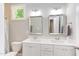 Clean bathroom with double vanity, and updated fixtures at 206 Cardinal Ct, Oxford, NC 27565