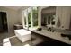 Luxurious bathroom with a freestanding tub, double vanity, and natural light at 2332 Windy Woods Dr, Raleigh, NC 27607