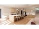 Modern kitchen with large island, ample cabinetry, and high-end appliances at 2332 Windy Woods Dr, Raleigh, NC 27607