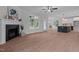 Open living room with hardwood floors and a view into the kitchen at 85 Vino Trl, Franklinton, NC 27525