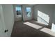 Bright bedroom with neutral walls and carpeted floors at 1027 Westerland Way # 48, Durham, NC 27703