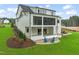 White two-story house with screened porch and backyard at 1621 Legacy Ridge Ln, Wake Forest, NC 27587