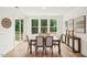 Bright dining room with hardwood floors and access to deck at 1513 Patchings Ln, Knightdale, NC 27545