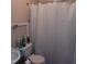 Simple bathroom with a shower, toilet, and sink at 1852 Nc 62 Hwy N, Burlington, NC 27217