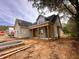 Exterior view of a craftsman style home under construction at 724 Coley Farm Rd, Fuquay Varina, NC 27526