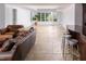 Spacious basement recreation area with a bar and large windows at 32529 Archdale, Chapel Hill, NC 27517
