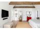 Bright bedroom with hardwood floors and access to a hallway at 32529 Archdale, Chapel Hill, NC 27517