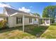 Home features carport, sunroom and detached shed at 317 Quintas Ave, Burlington, NC 27215