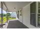 Inviting front porch with grey flooring and wooden accents at 317 Quintas Ave, Burlington, NC 27215