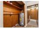 Hallway with water heater and storage shelving at 317 Quintas Ave, Burlington, NC 27215