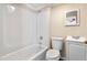 Clean bathroom with a tub, toilet, and vanity at 317 Quintas Ave, Burlington, NC 27215