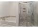 Bathroom with soaking tub and walk-in shower at 1121 Talisker Way, Burlington, NC 27215