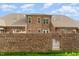 Brick home with private gated backyard access at 1121 Talisker Way, Burlington, NC 27215