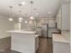 Modern kitchen with stainless steel appliances and white cabinets at 1121 Talisker Way, Burlington, NC 27215