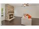 Living room with a modern stone fireplace and hardwood floors at 1121 Talisker Way, Burlington, NC 27215