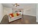 Open living space with a neutral-toned sofa and views into the kitchen at 1121 Talisker Way, Burlington, NC 27215