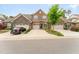 Two-story brick home with double garage and landscaped yard at 1121 Talisker Way, Burlington, NC 27215