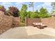Brick patio with seating area and grill, perfect for BBQs at 1121 Talisker Way, Burlington, NC 27215