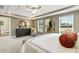 Main bedroom with sitting area and large windows at 3455 Piedmont Dr, Raleigh, NC 27604