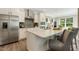 Modern kitchen with stainless steel appliances and an island at 3455 Piedmont Dr, Raleigh, NC 27604