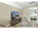 Bonus room with a large TV, comfy beanbag chairs, and plenty of space for games at 3455 Piedmont Dr, Raleigh, NC 27604