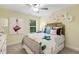 Bright bedroom with a queen-size bed and large window at 3455 Piedmont Dr, Raleigh, NC 27604