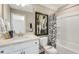 Clean bathroom with a shower/tub combo and white vanity at 3455 Piedmont Dr, Raleigh, NC 27604