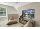 Spacious bonus room with a large TV and two cozy beanbag chairs at 3455 Piedmont Dr, Raleigh, NC 27604