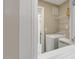 Laundry room with washer, dryer, and shelving at 3455 Piedmont Dr, Raleigh, NC 27604