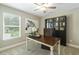 Home office featuring a desk, chair, and window at 3455 Piedmont Dr, Raleigh, NC 27604