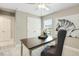 Home office with desk, chair, and built-in shelving at 3455 Piedmont Dr, Raleigh, NC 27604