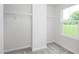 Walk-in closet with ample shelving and natural light at 6698 Gibraltar Rock Dr, Raleigh, NC 27610