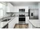 Well-equipped kitchen featuring stainless steel appliances at 6698 Gibraltar Rock Dr, Raleigh, NC 27610