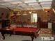 Game room featuring a pool table and airplane decor at 236 Olde Ferry Ln, Dunn, NC 28334