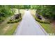 Stone pillars mark the entrance to a wooded community at 236 Olde Ferry Ln, Dunn, NC 28334